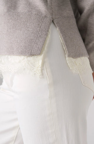Detail of ribbed hem, side slit and lace trim on Liverpool grey sweater