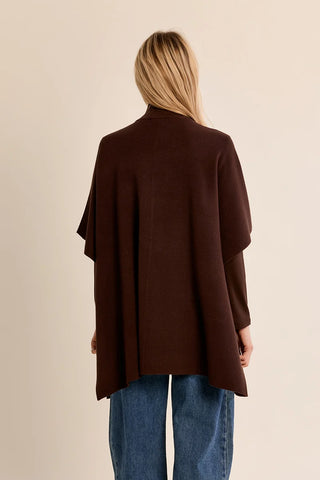Back view of wide rectangular Molly Bracken brown knit cape