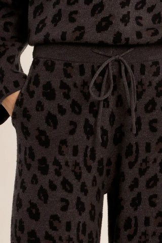 Close view of Molly Bracken leopard knit trousers with a drawstring waist and side pocket