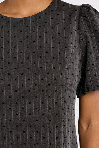 Close up of pinstripe fabric and tiny hearts on Molly Bracken mini dress