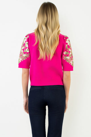 Back view of THML pink floral short sleeve sweater